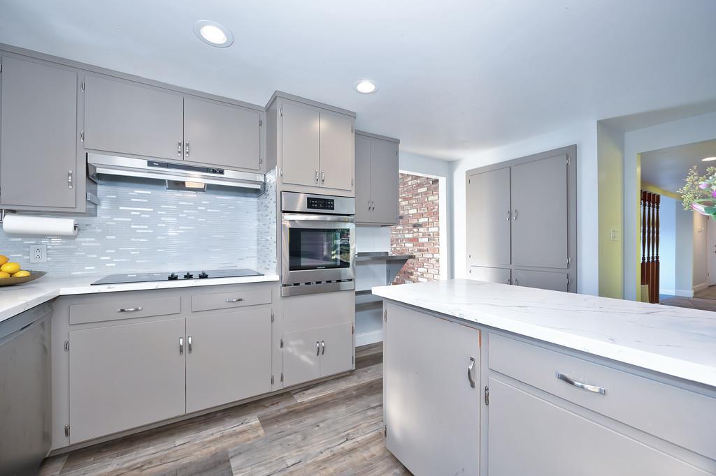 2298 Pinon Road Rescue, CA 95672 - Photo 19 of 67 a kitchen with appliances a sink and cabinets