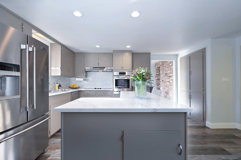2298 Pinon Road Rescue, CA 95672 - Photo 22 of 67 a kitchen with counter top space cabinets and stainless steel appliances
