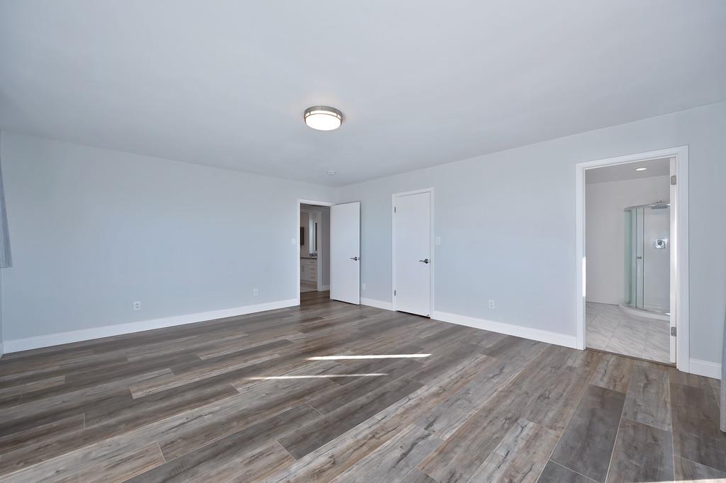2298 Pinon Road Rescue, CA 95672 - Photo 36 of 67 a view of an empty room with wooden floor and closet