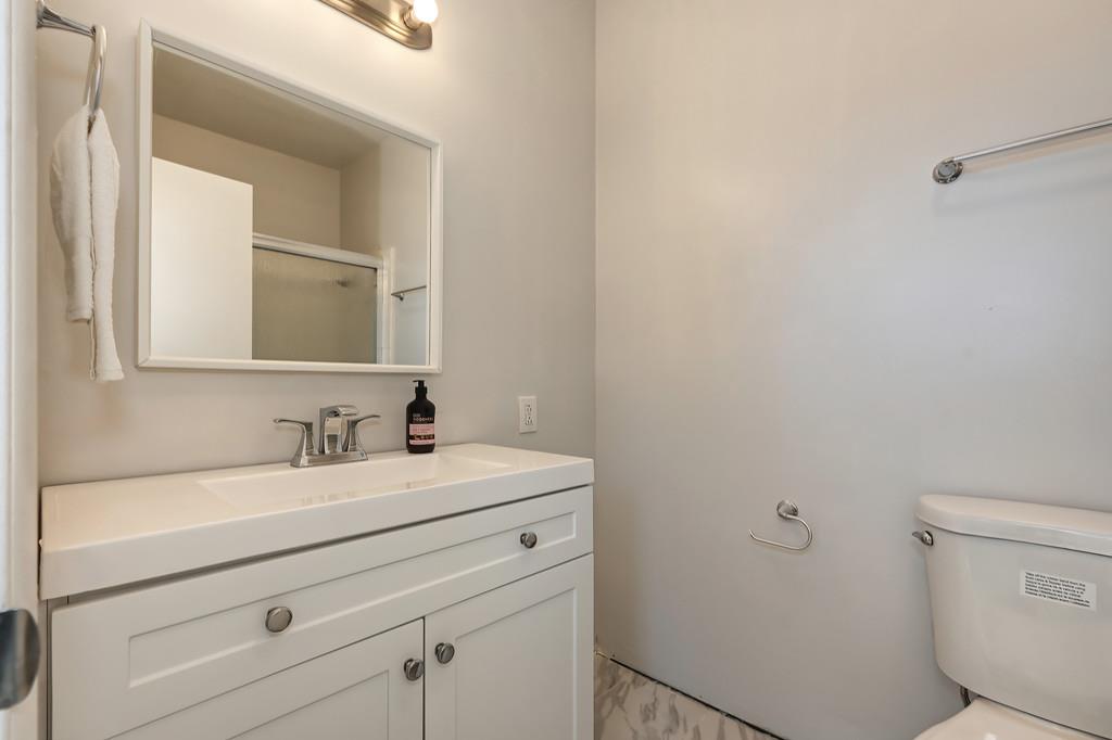 2298 Pinon Road Rescue, CA 95672 - Photo 51 of 67 a bathroom with a sink toilet and mirror