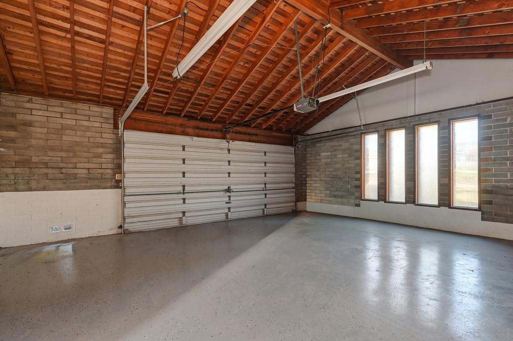 2298 Pinon Road Rescue, CA 95672 - Photo 53 of 67 a view of an empty room with wooden floor and white walls