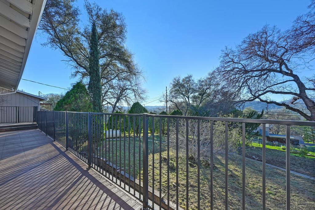 2298 Pinon Road Rescue, CA 95672 - Photo 57 of 67 a view of balcony with wooden fence and floor