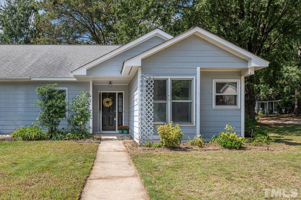 3120 Quinley Place Raleigh, NC 27604 - Photo 1 of 18 a front view of a house with garden