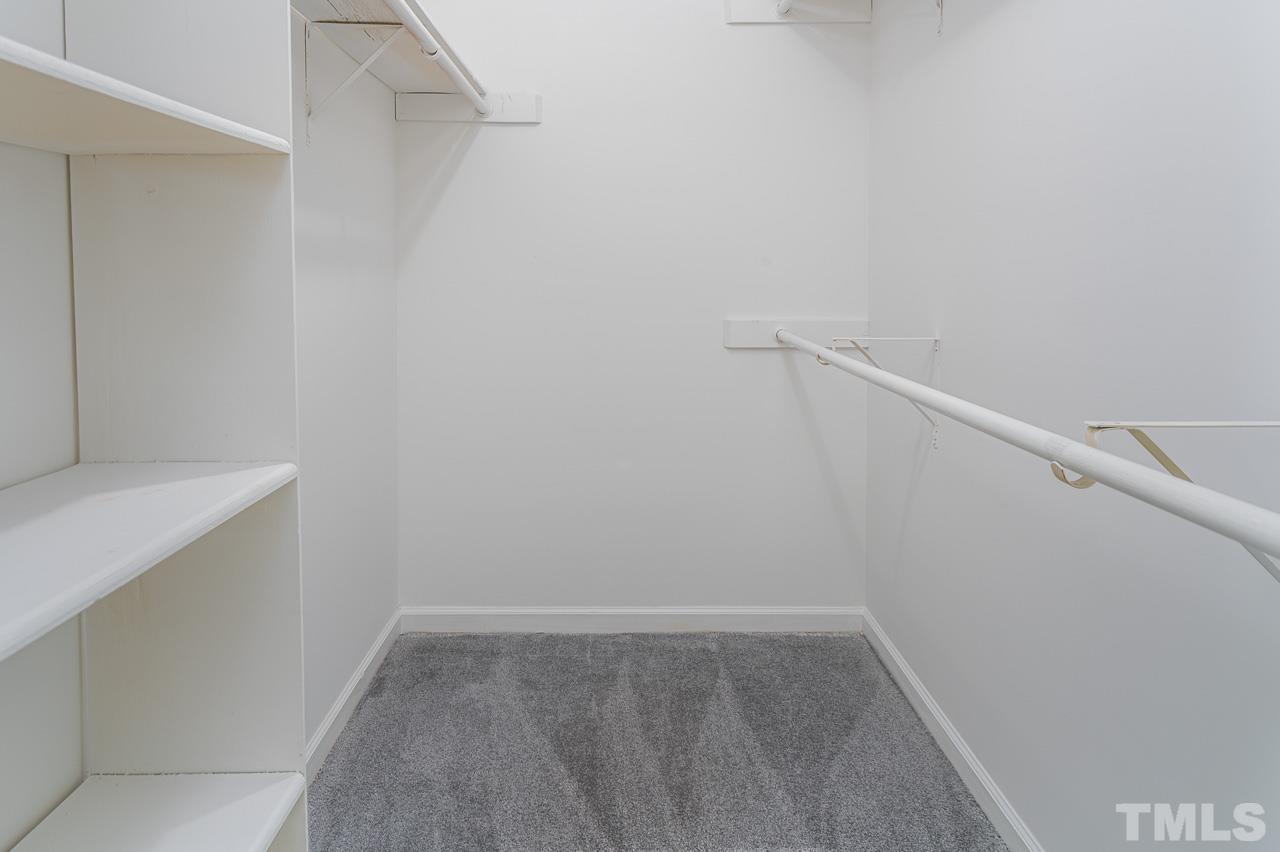 3120 Quinley Place Raleigh, NC 27604 - Photo 17 of 18 a view of small space with racks on the wall