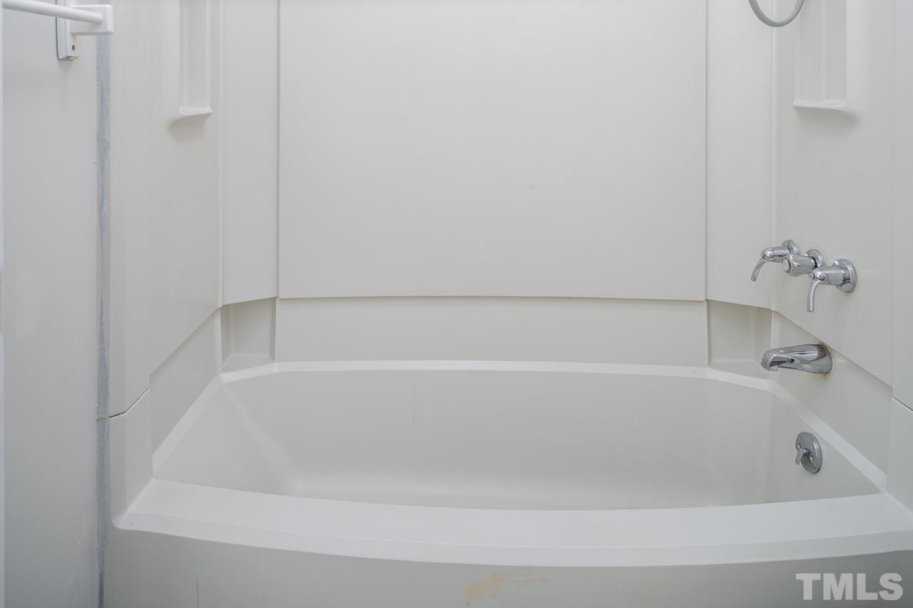 3120 Quinley Place Raleigh, NC 27604 - Photo 18 of 18 a bathroom with a bathtub