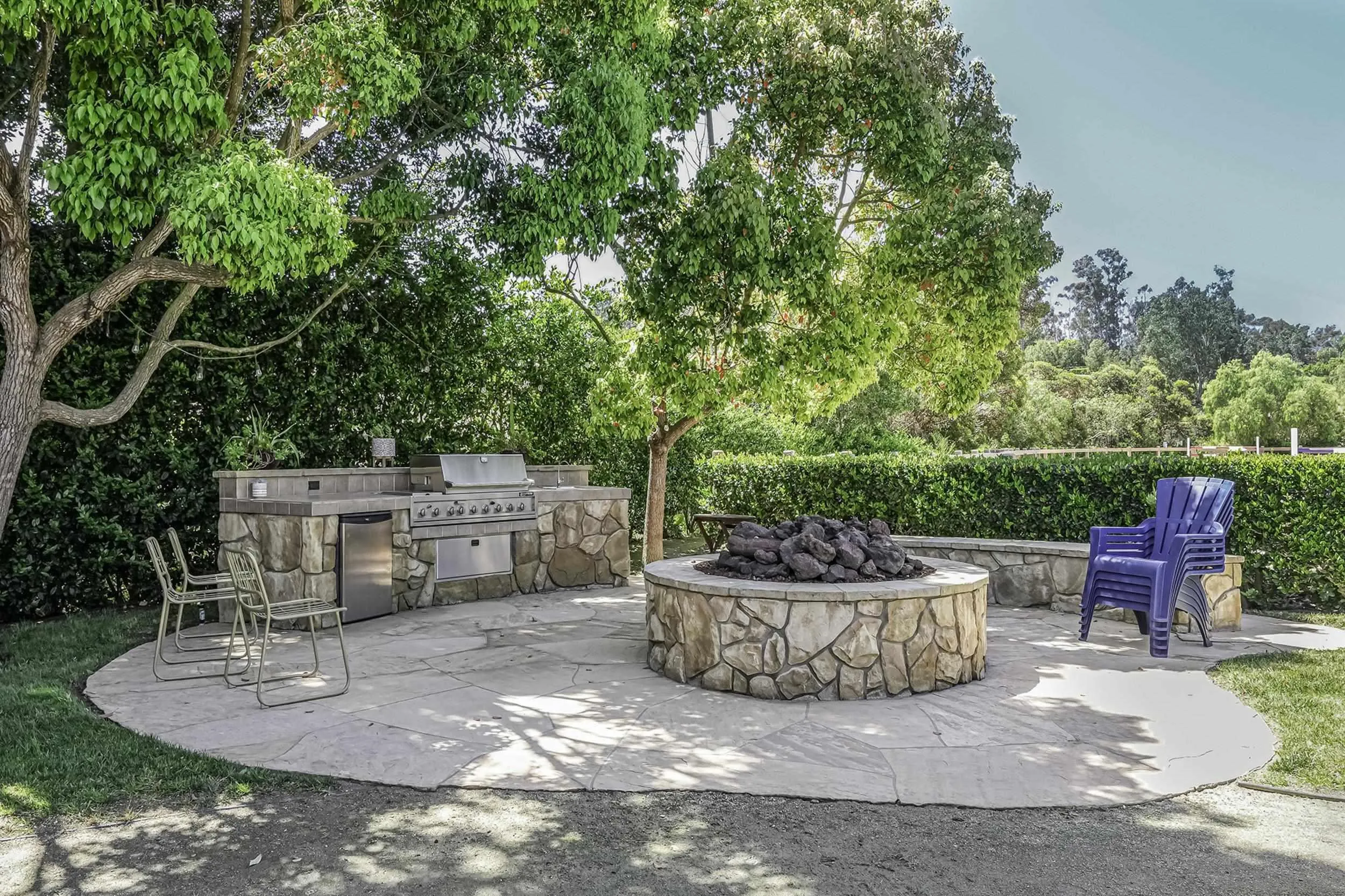 5305 La Crescenta Road Rancho Santa Fe, CA 92067 - Photo 14 of 63 Great entertaining down at the barn area with the fire pit, and full BBQ bar with side-burner and refrigerator