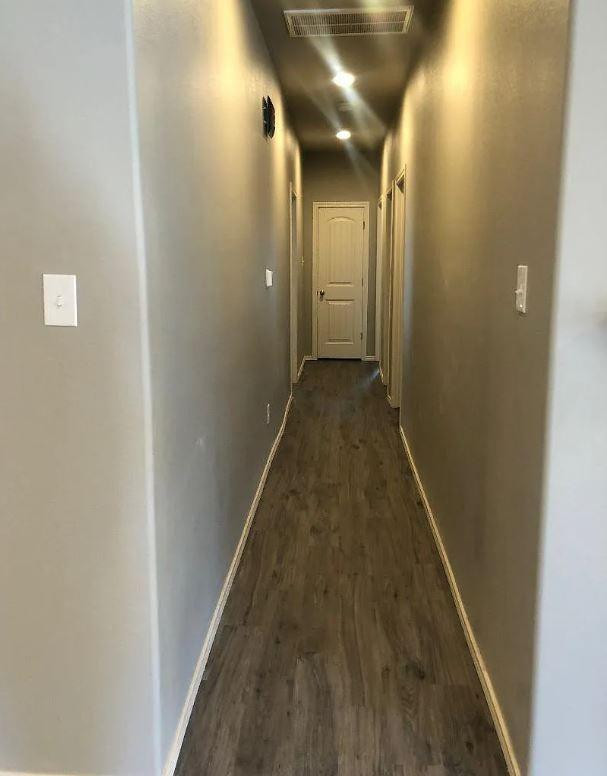1203 Preston Trail, Unit B Wolfforth, TX 79382 - Photo 7 of 13 a view of a hallway
