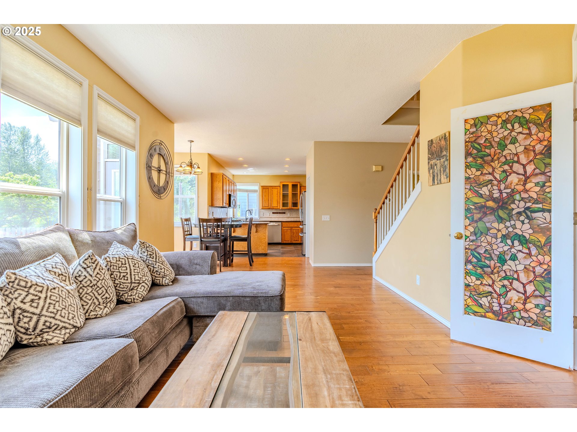 308 Southwest 38th Loop Gresham, OR 97080 - Photo 20 of 48 a living room with furniture and a large window
