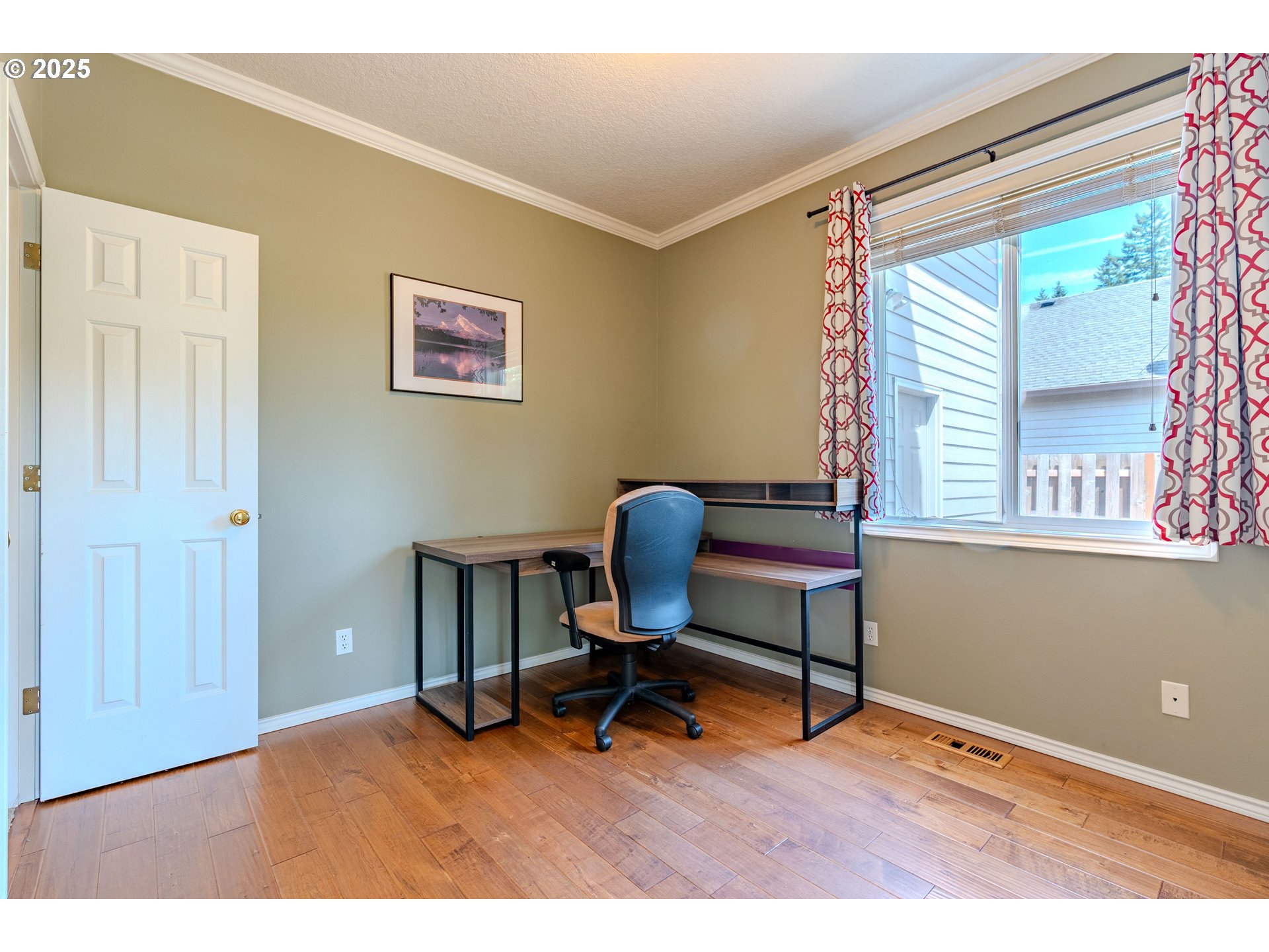 308 Southwest 38th Loop Gresham, OR 97080 - Photo 23 of 48 a workspace with furniture and a window