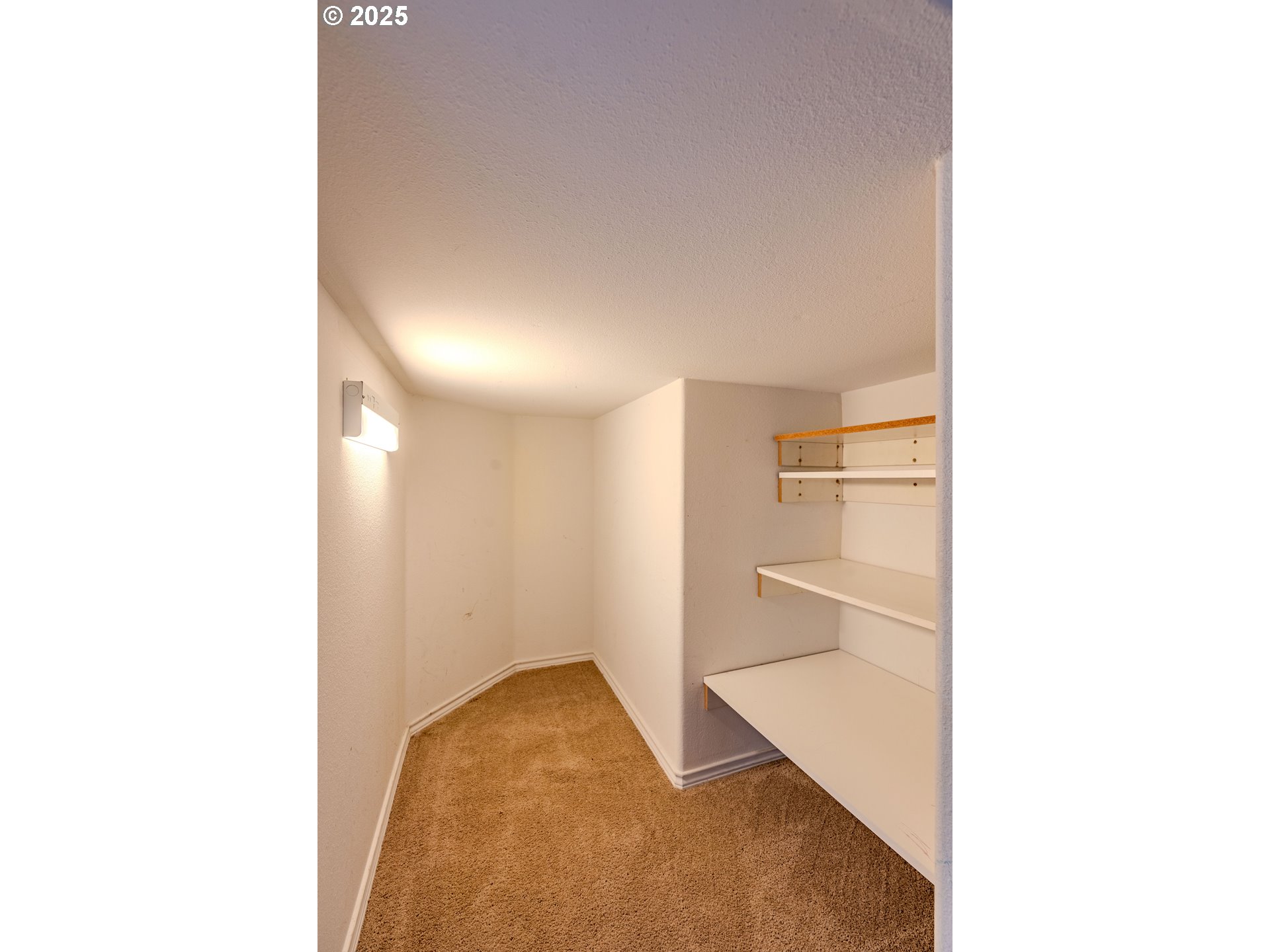 308 Southwest 38th Loop Gresham, OR 97080 - Photo 24 of 48 a view of a living room with a white wall