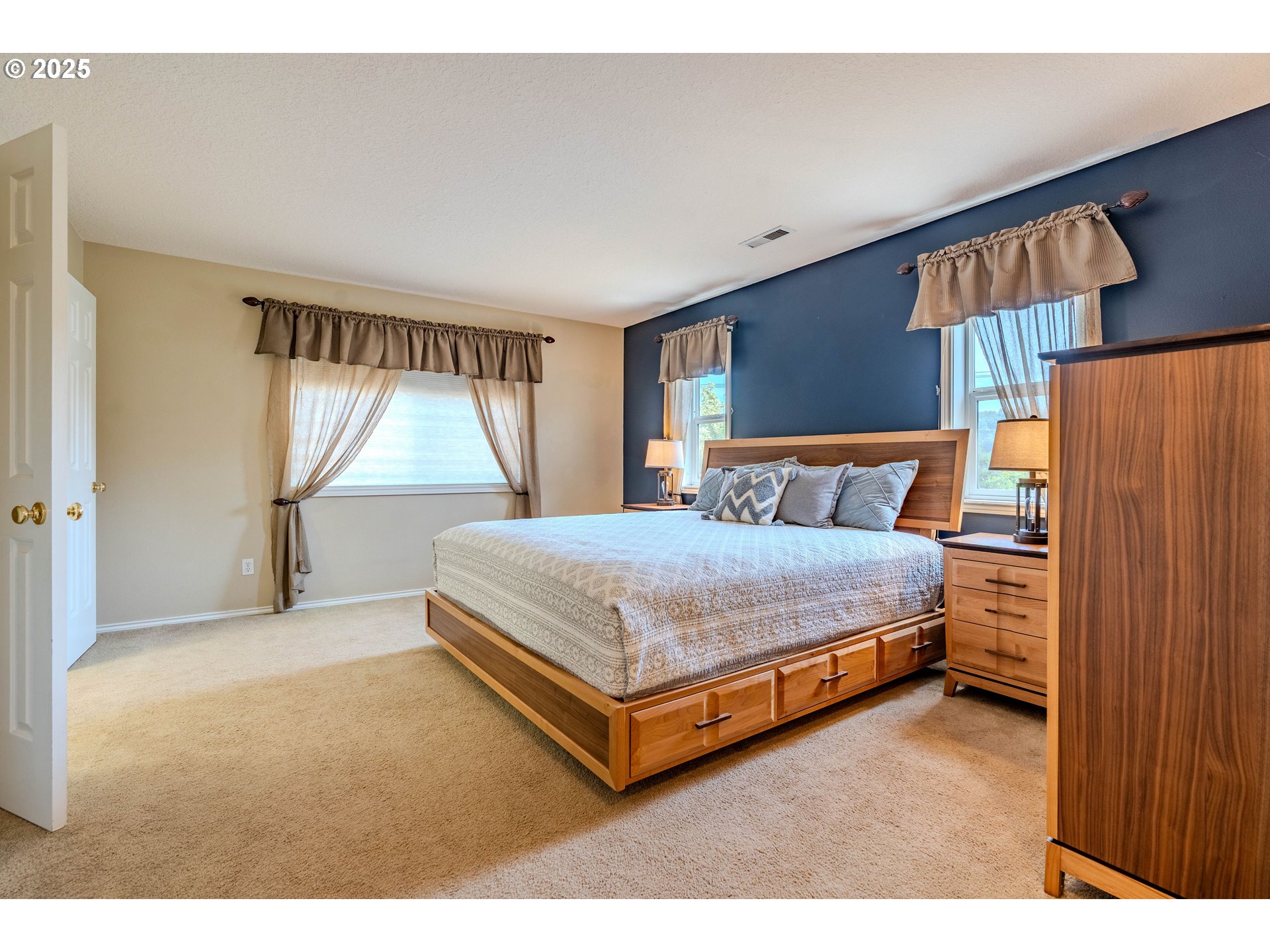 308 Southwest 38th Loop Gresham, OR 97080 - Photo 28 of 48 a bedroom with a bed and a window