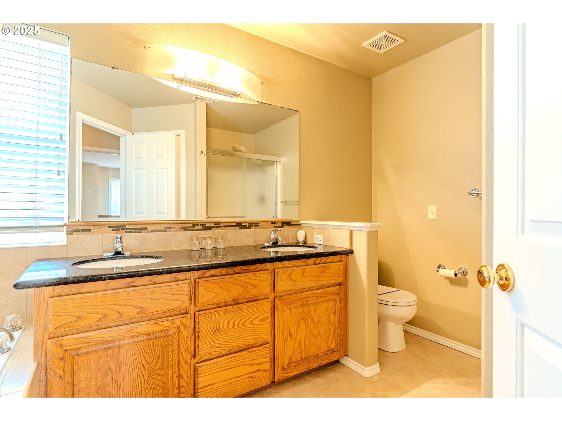 308 Southwest 38th Loop Gresham, OR 97080 - Photo 31 of 48 a bathroom with a sink and a mirror