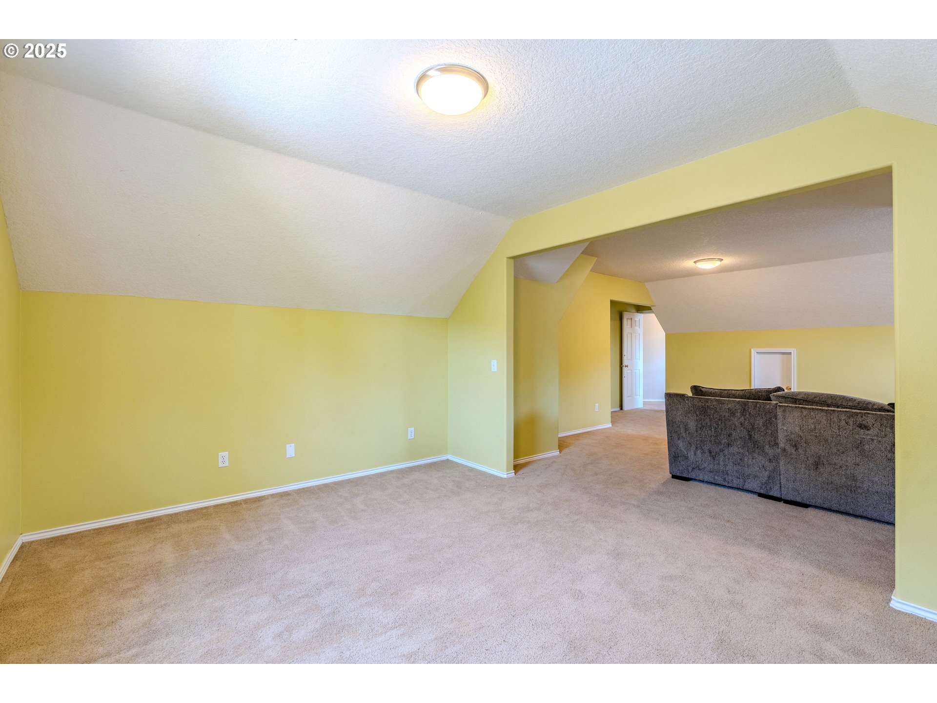 308 Southwest 38th Loop Gresham, OR 97080 - Photo 42 of 48 a view of an empty room with a fireplace