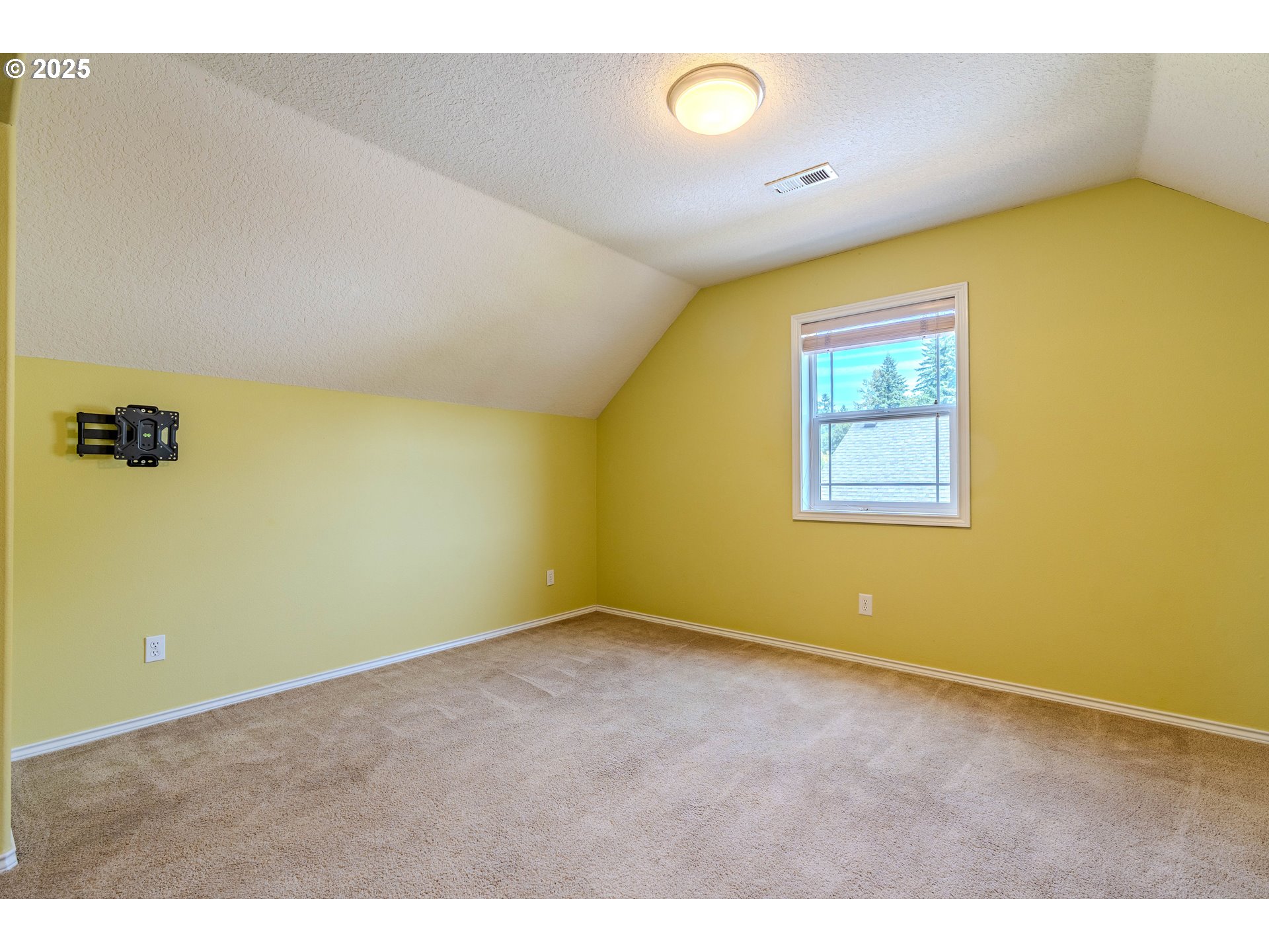 308 Southwest 38th Loop Gresham, OR 97080 - Photo 43 of 48 a view of an empty room with a window