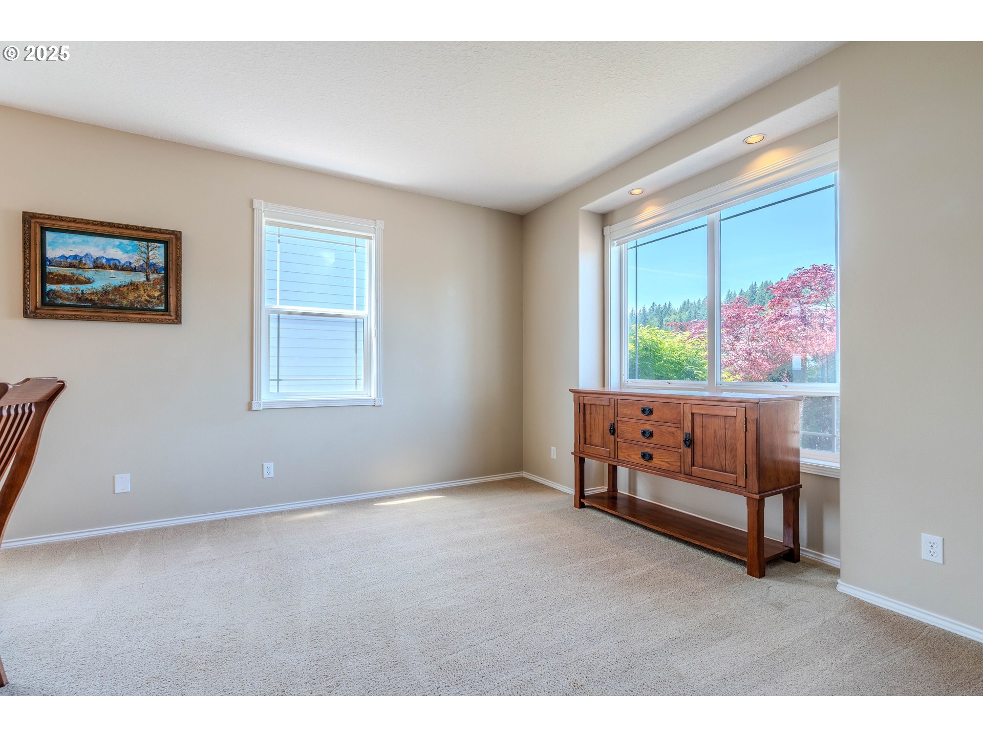 308 Southwest 38th Loop Gresham, OR 97080 - Photo 7 of 48 a view of an empty room with a window