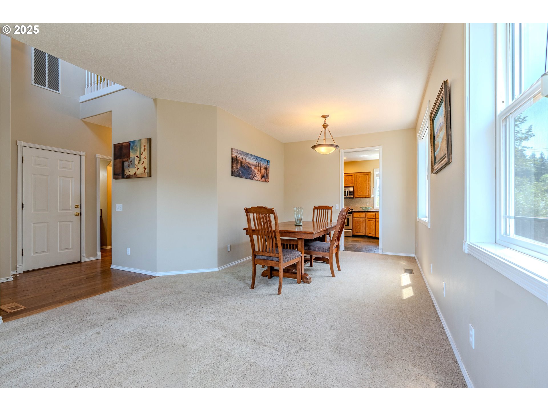 308 Southwest 38th Loop Gresham, OR 97080 - Photo 9 of 48 a view of a livingroom with furniture and a window