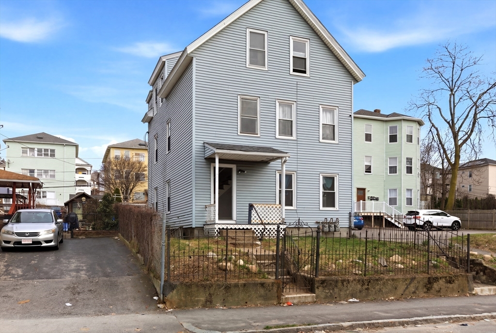 81 Ward Street Worcester, MA 01610 - Photo 26 of 34 a front view of a house with garden