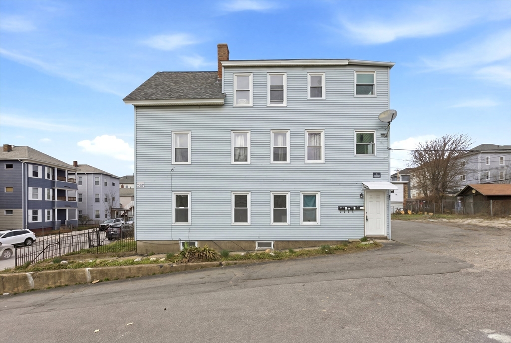 81 Ward Street Worcester, MA 01610 - Photo 28 of 34 a front view of a house with a road
