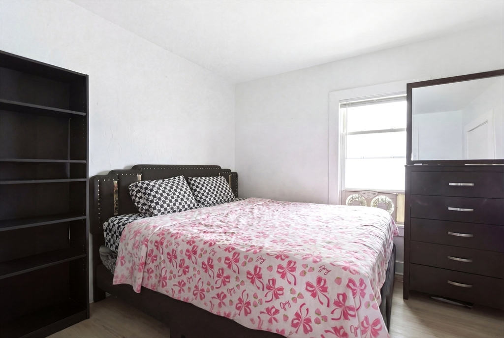 81 Ward Street Worcester, MA 01610 - Photo 10 of 34 a bedroom with a bed and with closet