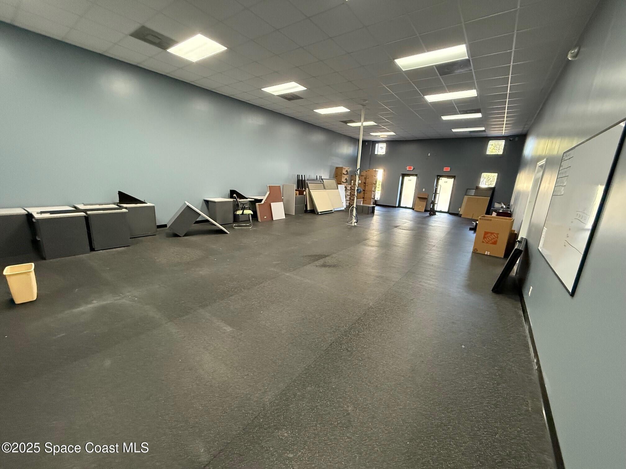 5121 Industry Drive, Unit 103105 Melbourne, FL 32940 - Photo 6 of 13 a view of a room with gym equipment