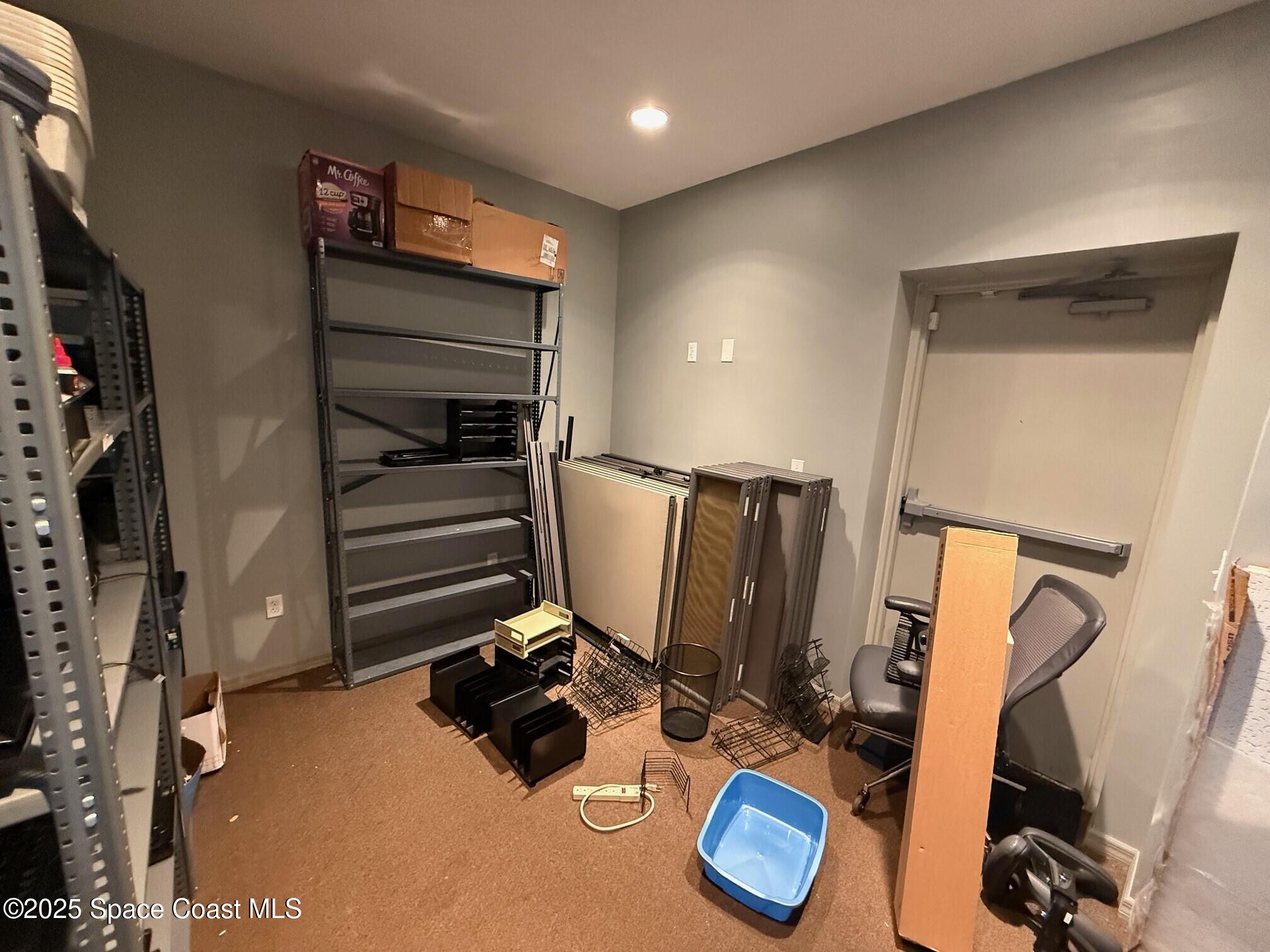 5121 Industry Drive, Unit 103105 Melbourne, FL 32940 - Photo 9 of 13 a view of a room with gym equipment