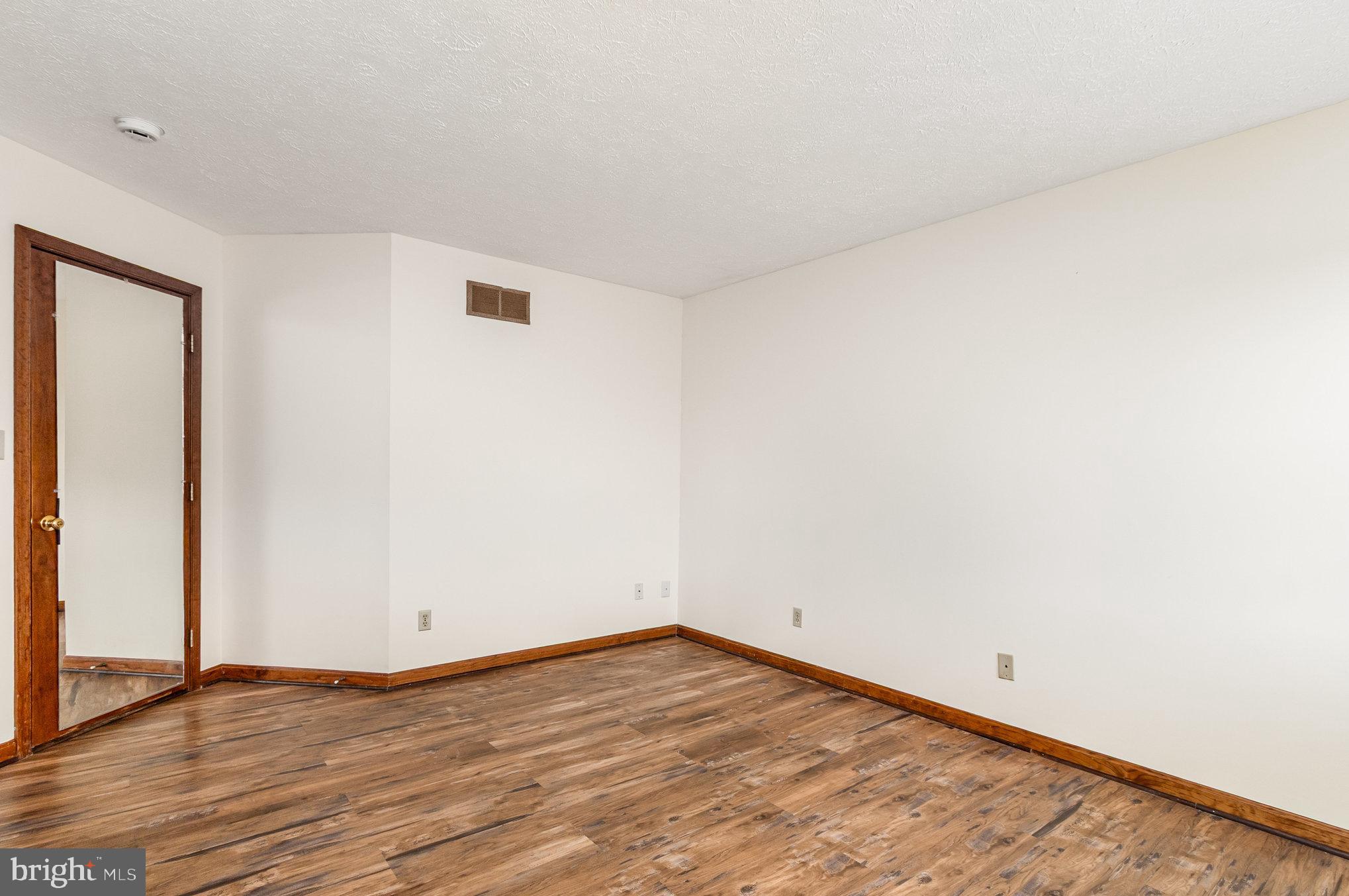 1454 Oldfield Point Road Elkton, MD 21921 - Photo 16 of 55 Primary Bedroom features Laminate Flooring