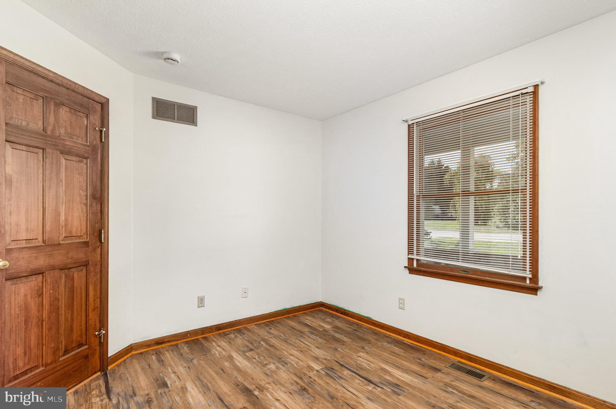 1454 Oldfield Point Road Elkton, MD 21921 - Photo 18 of 55 Bedroom Two includes Laminate Flooring
