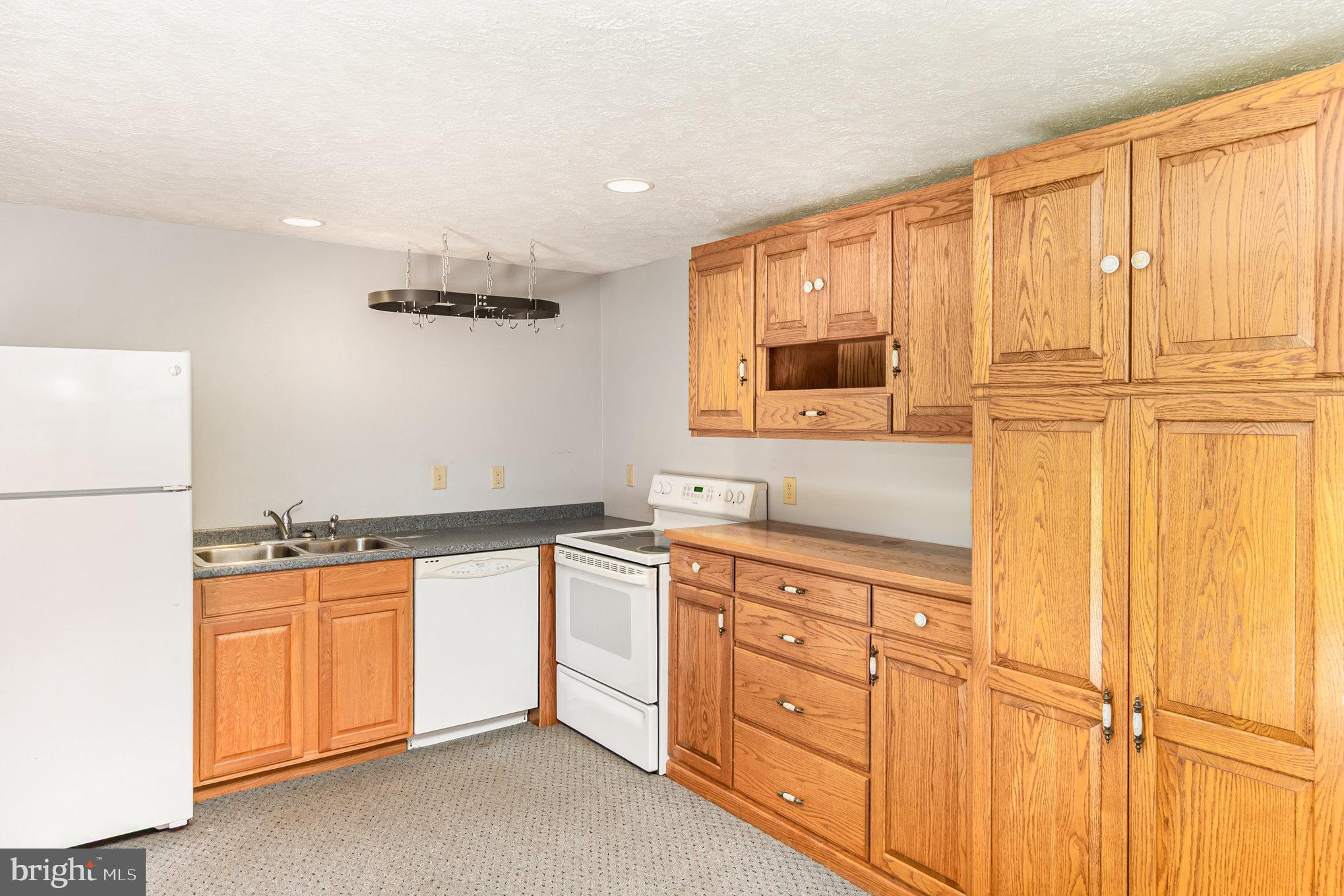 1454 Oldfield Point Road Elkton, MD 21921 - Photo 25 of 55 Lower-Level Second Kitchen
