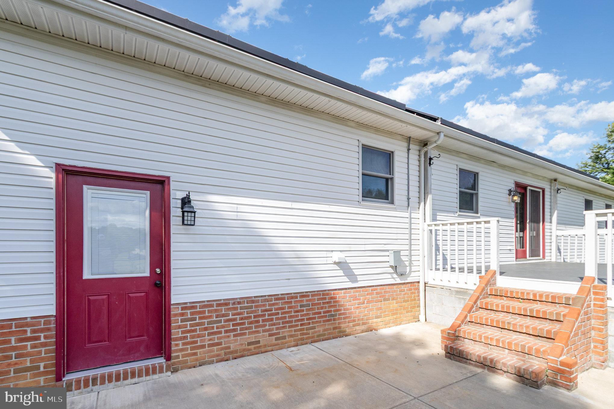 1454 Oldfield Point Road Elkton, MD 21921 - Photo 34 of 55 Convenient Laundry Room Exterior Access