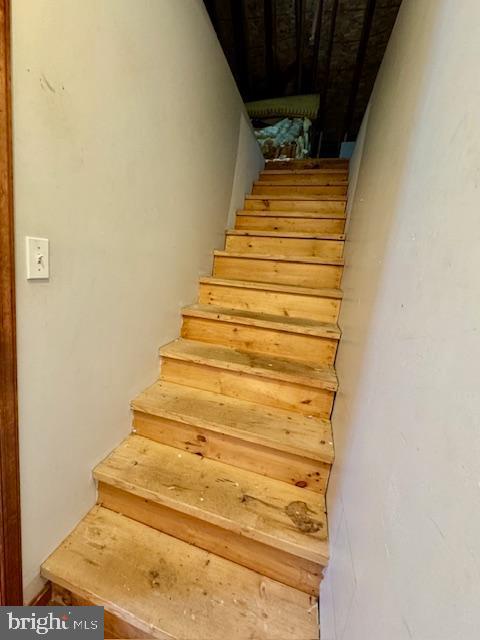 1454 Oldfield Point Road Elkton, MD 21921 - Photo 45 of 55 Attic Walk Up Stairs adjacent to Dining Area
