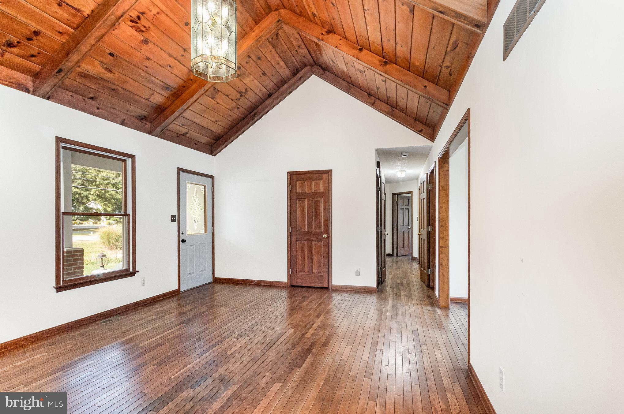 1454 Oldfield Point Road Elkton, MD 21921 - Photo 10 of 55 Beautiful Hardwoods & Wood Beamed Vaulted Ceiling