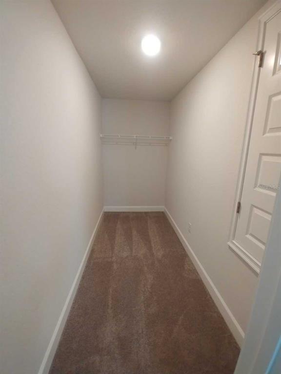 4380 Southwest 92nd Pl Road Ocala, FL 34476 - Photo 41 of 57 a view of small space with wooden floor and white walls