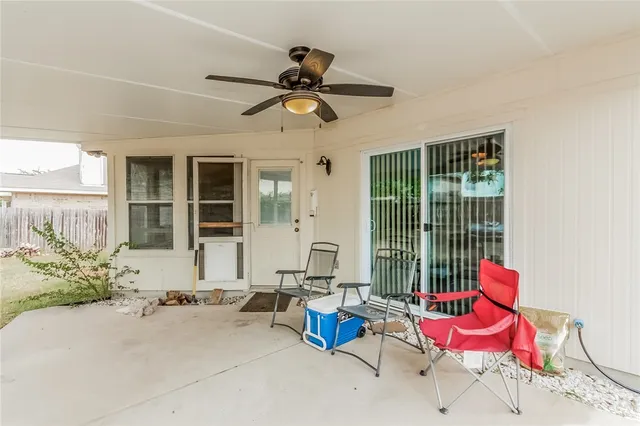 a bedroom with furniture and window