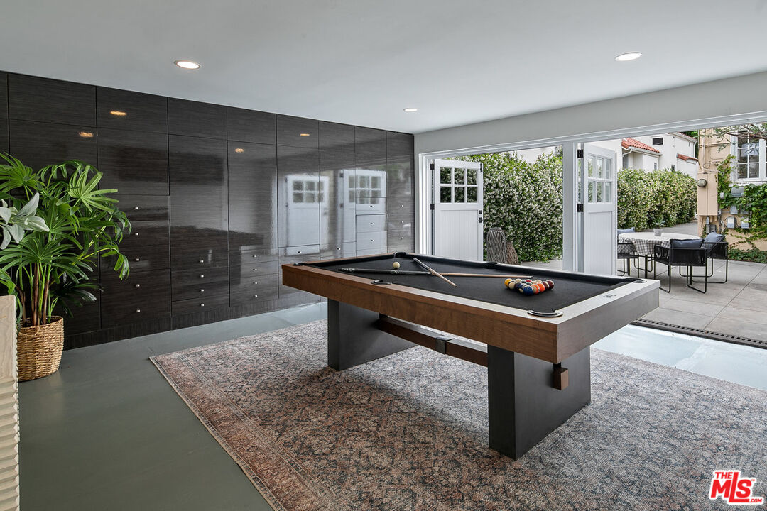 232 North Windsor Boulevard Los Angeles, CA 90004 - Photo 15 of 20 a room with furniture pool table and a potted plant