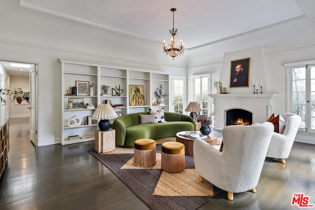 232 North Windsor Boulevard Los Angeles, CA 90004 - Photo 2 of 20 a living room with furniture large window and a fireplace