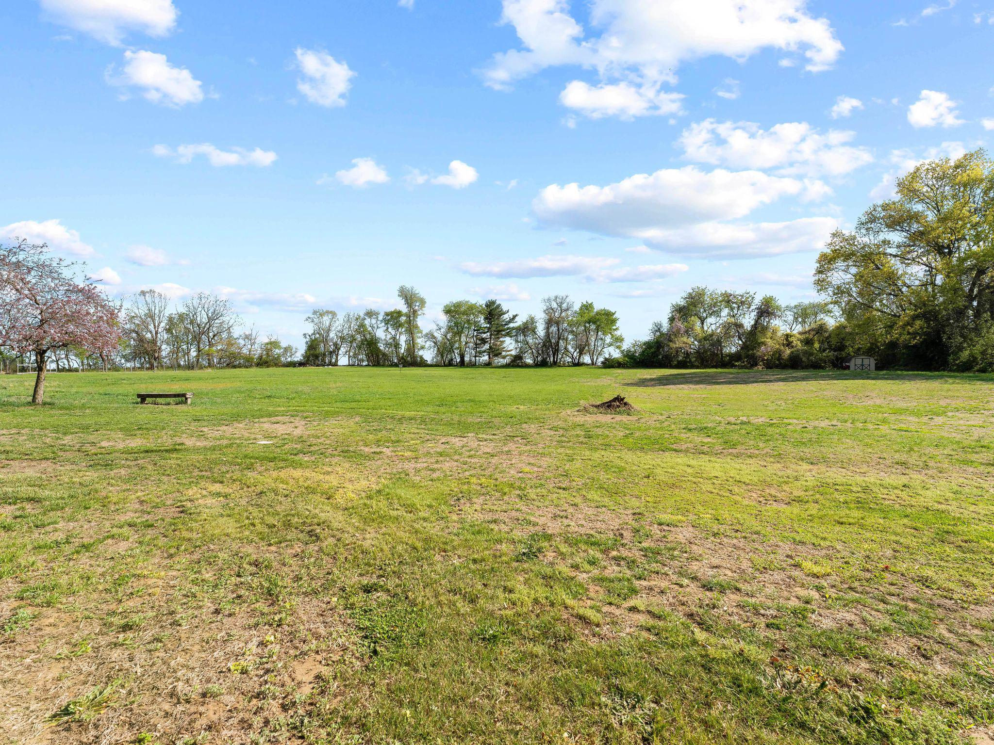 249 Jessups Mill Road Clarksboro, NJ 08020 - Photo 39 of 55 Spacious green expanse under blue skies.