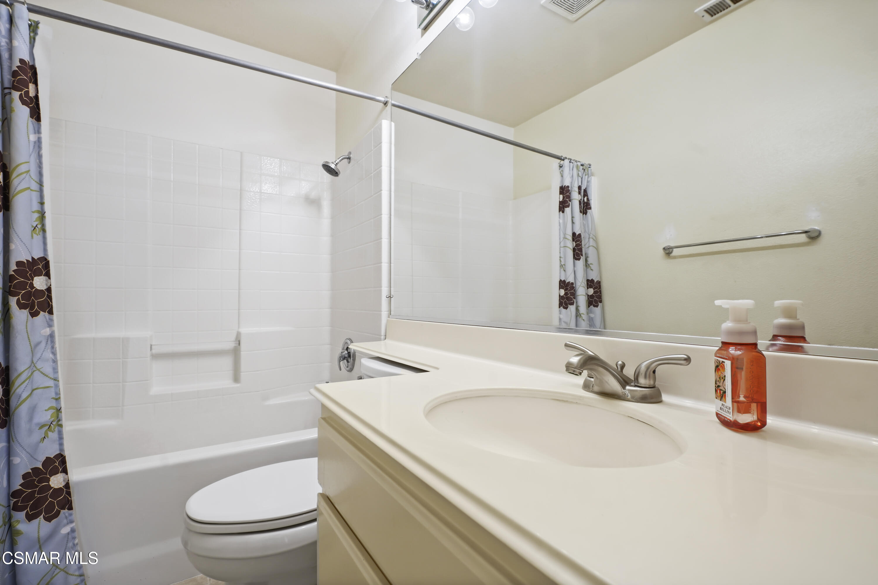 663 Novato Drive Oxnard, CA 93035 - Photo 27 of 40 a bathroom with a sink a toilet and shower