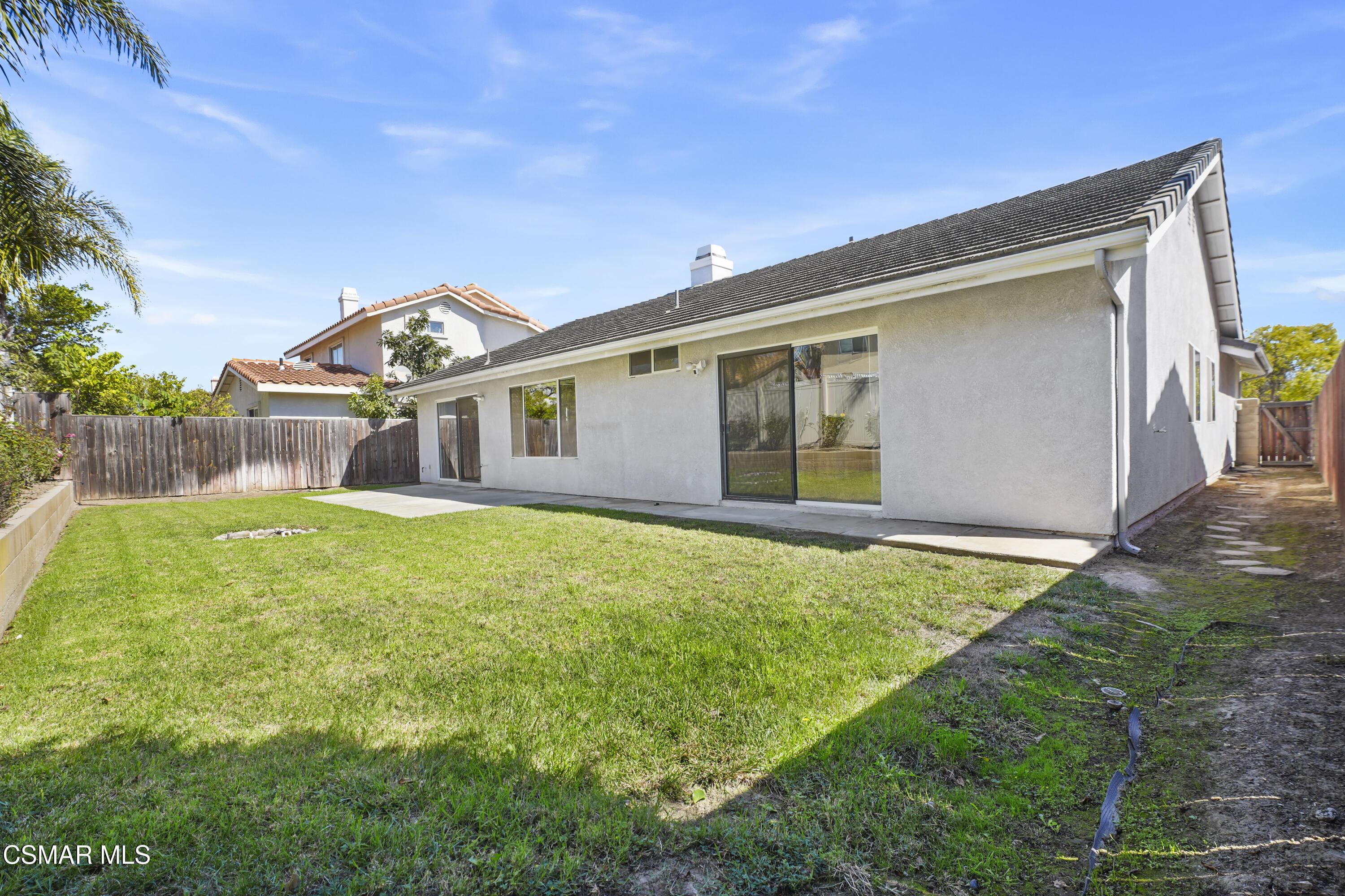 663 Novato Drive Oxnard, CA 93035 - Photo 34 of 40 a front view of a house with garden