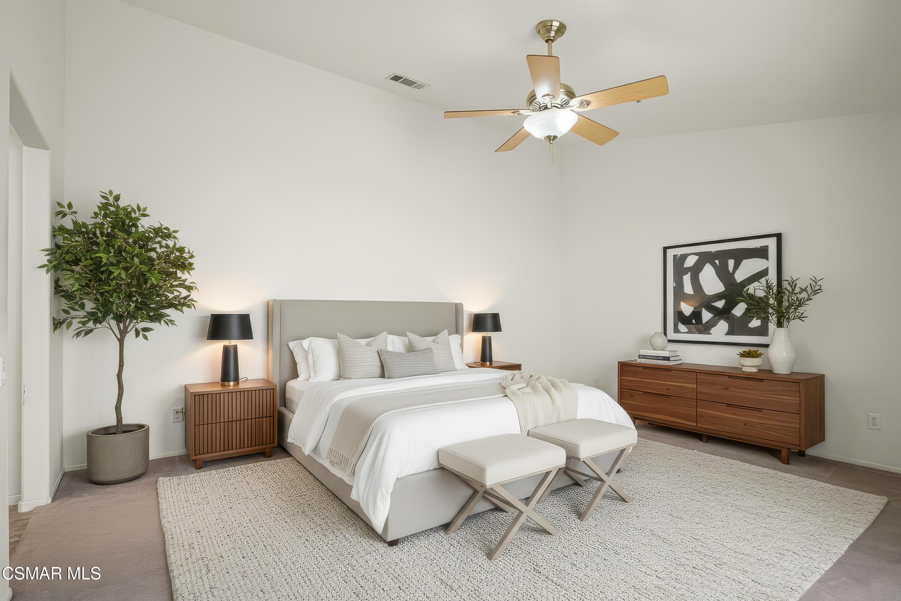 663 Novato Drive Oxnard, CA 93035 - Photo 4 of 40 a bedroom with a bed and a potted plant