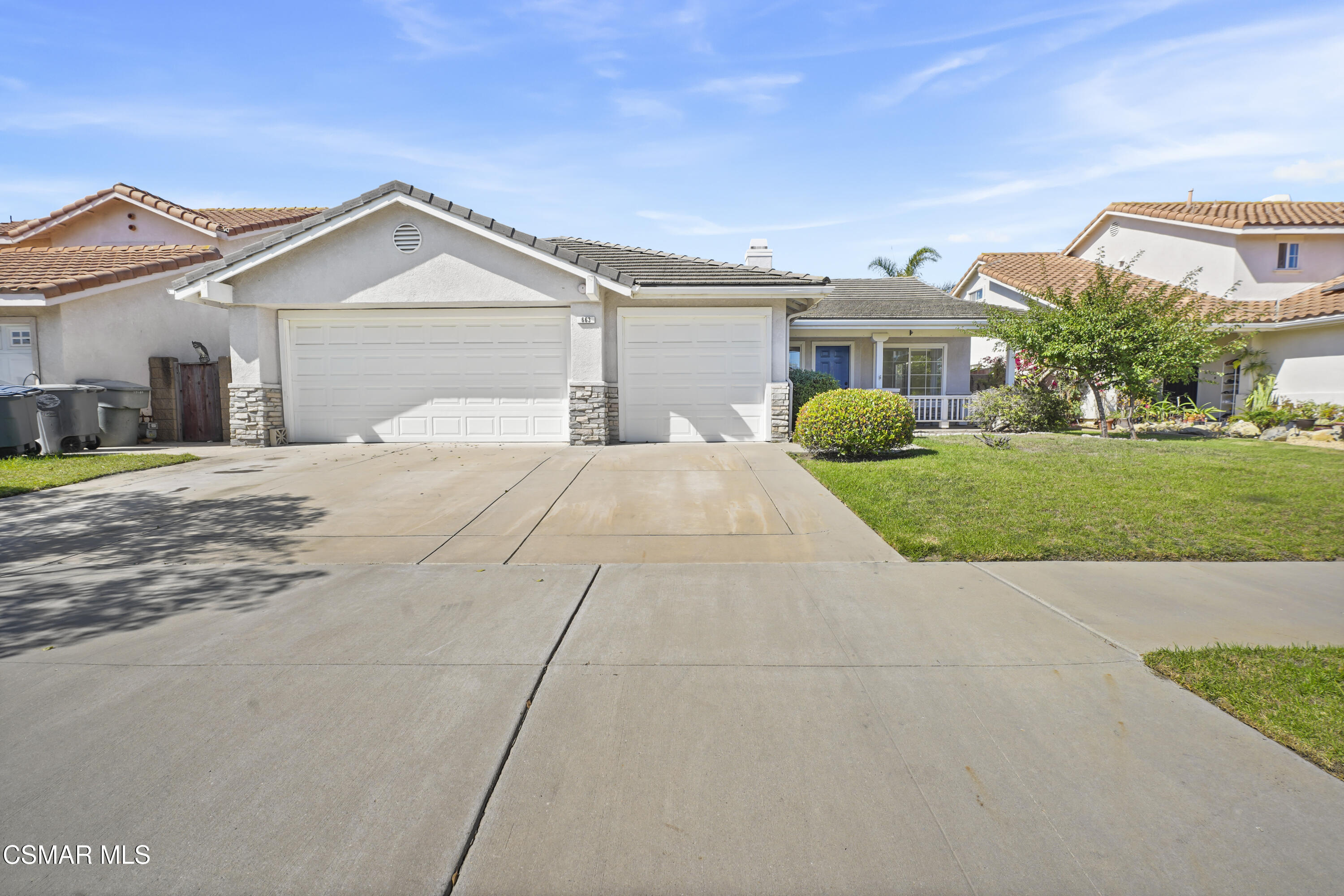 663 Novato Drive Oxnard, CA 93035 - Photo 5 of 40 a front view of a house with garden