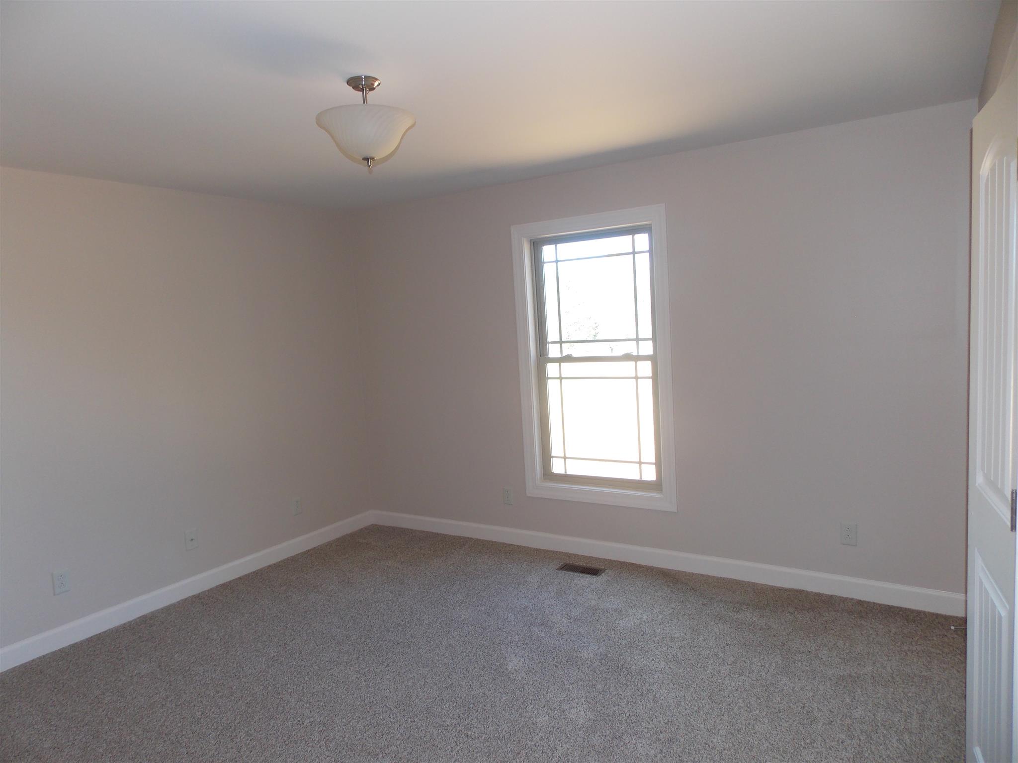 400 Goshen Road Lebanon, TN 37087 - Photo 11 of 20 an empty room with a window
