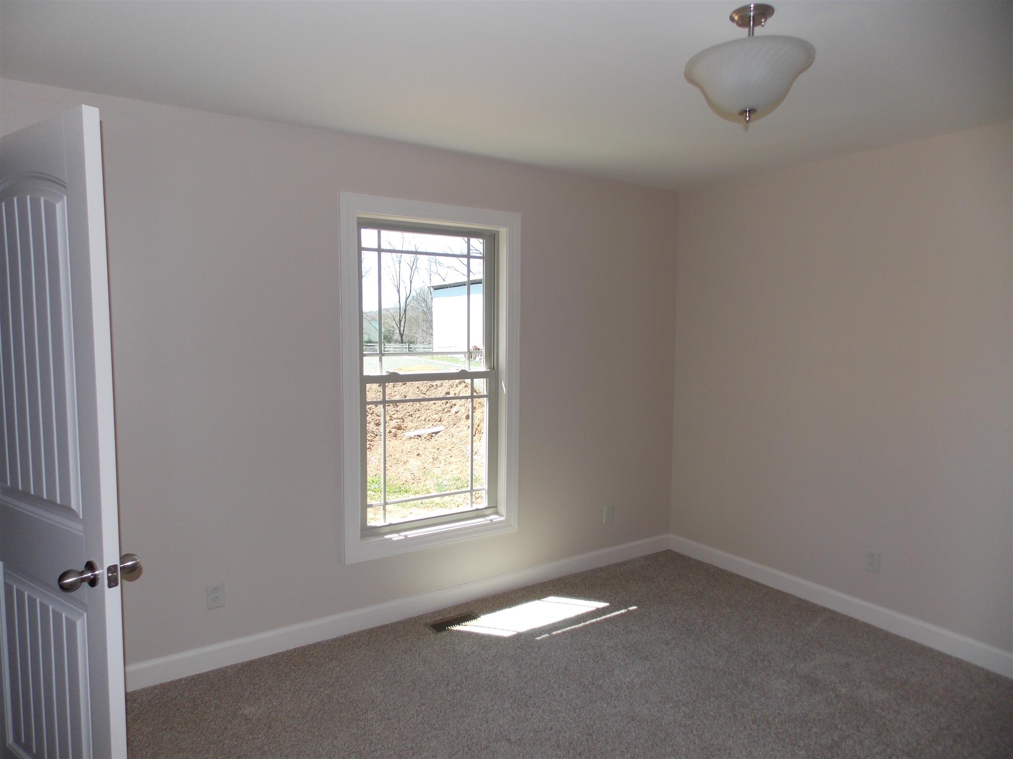 400 Goshen Road Lebanon, TN 37087 - Photo 13 of 20 an empty room with a window