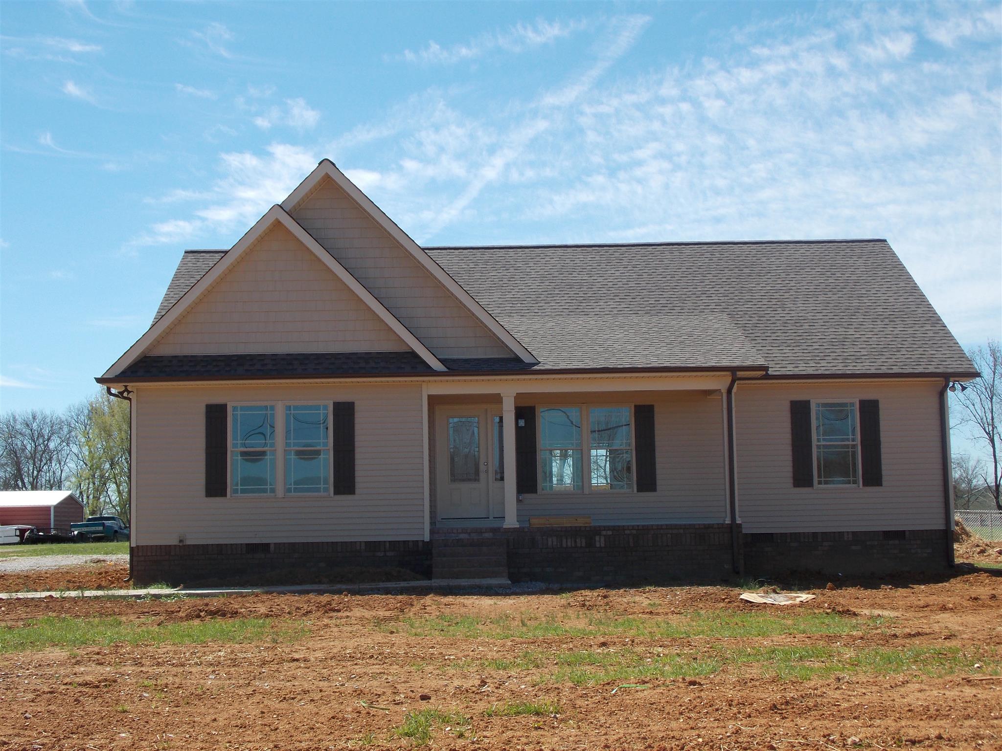 400 Goshen Road Lebanon, TN 37087 - Photo 2 of 20 a house that has a big yard