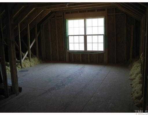 220 Forbes Road, Unit LOT13 Wake Forest, NC 27587 - Photo 12 of 12 Unfinished Walk-up Attic / Windows / fabulous storage / finished staircase from 2cd floor / room to grow