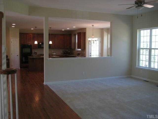220 Forbes Road, Unit LOT13 Wake Forest, NC 27587 - Photo 6 of 12 10' Ceiling / Open to Kitchen & Breakfast nook / 36" direct-vent gas fireplace / ceiling fan / double twin windows beside fireplace