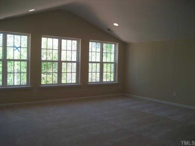 220 Forbes Road, Unit LOT13 Wake Forest, NC 27587 - Photo 10 of 12 Vaulted ceiling / wall of windows overlooking forest / recessed lights / has 4' extension