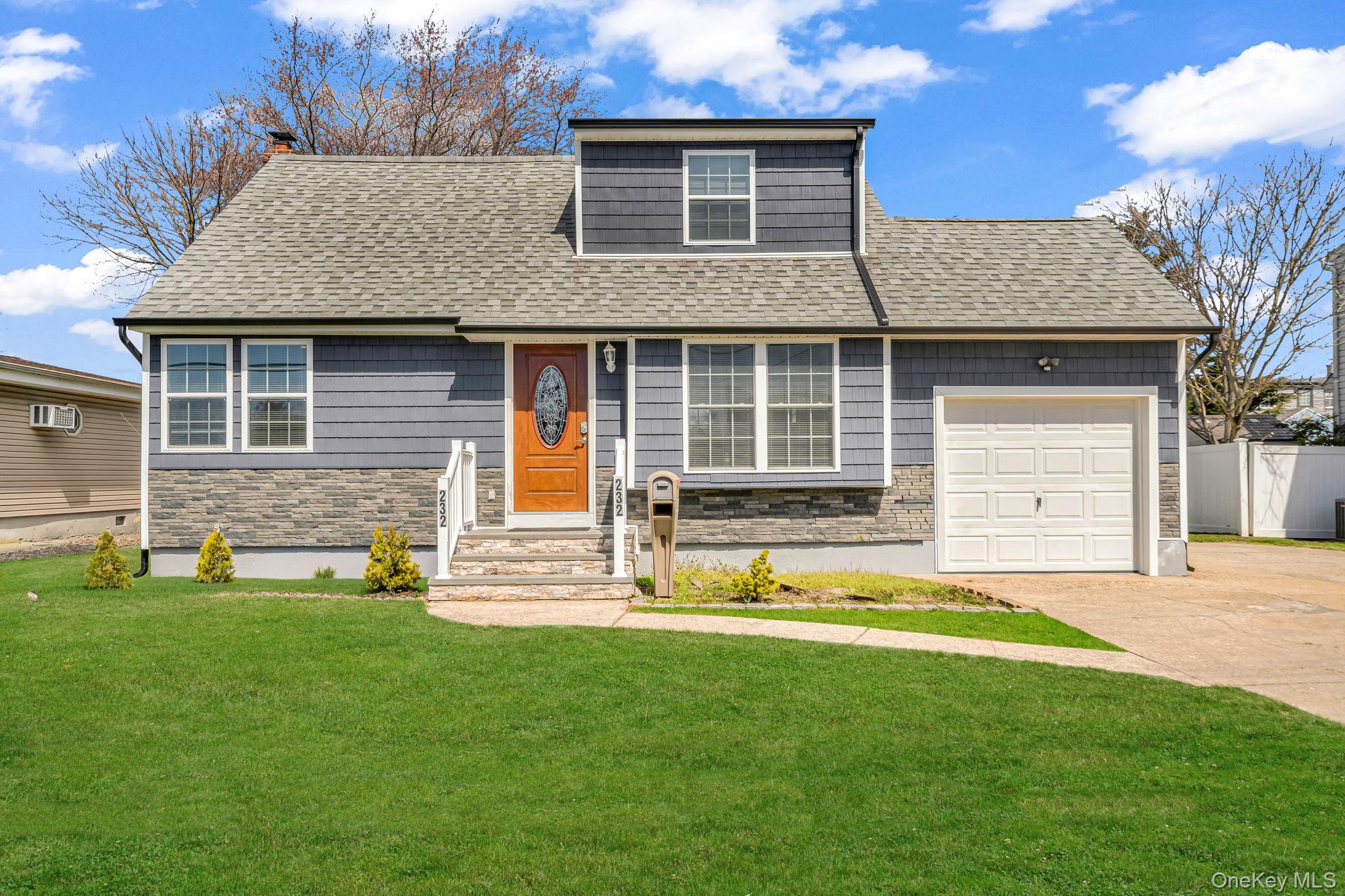 232 30th Street Lindenhurst, NY 11757 - Photo 1 of 46 a view of a house with a backyard and a tree