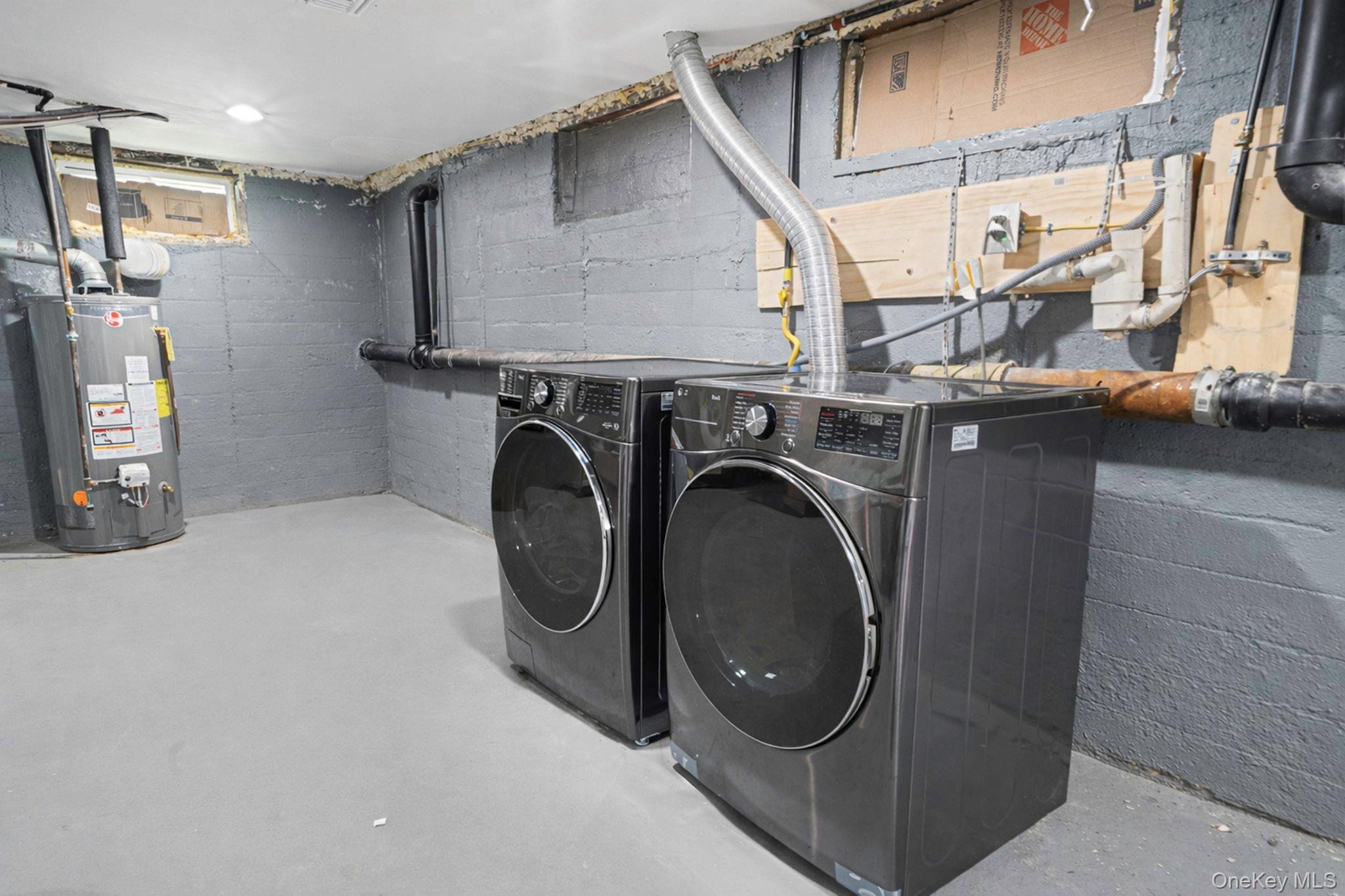 232 30th Street Lindenhurst, NY 11757 - Photo 31 of 46 a utility room with dryer and washer