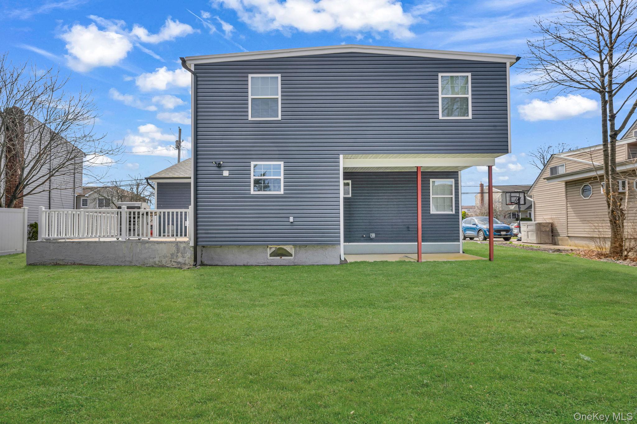 232 30th Street Lindenhurst, NY 11757 - Photo 37 of 46 a view of a house with a backyard