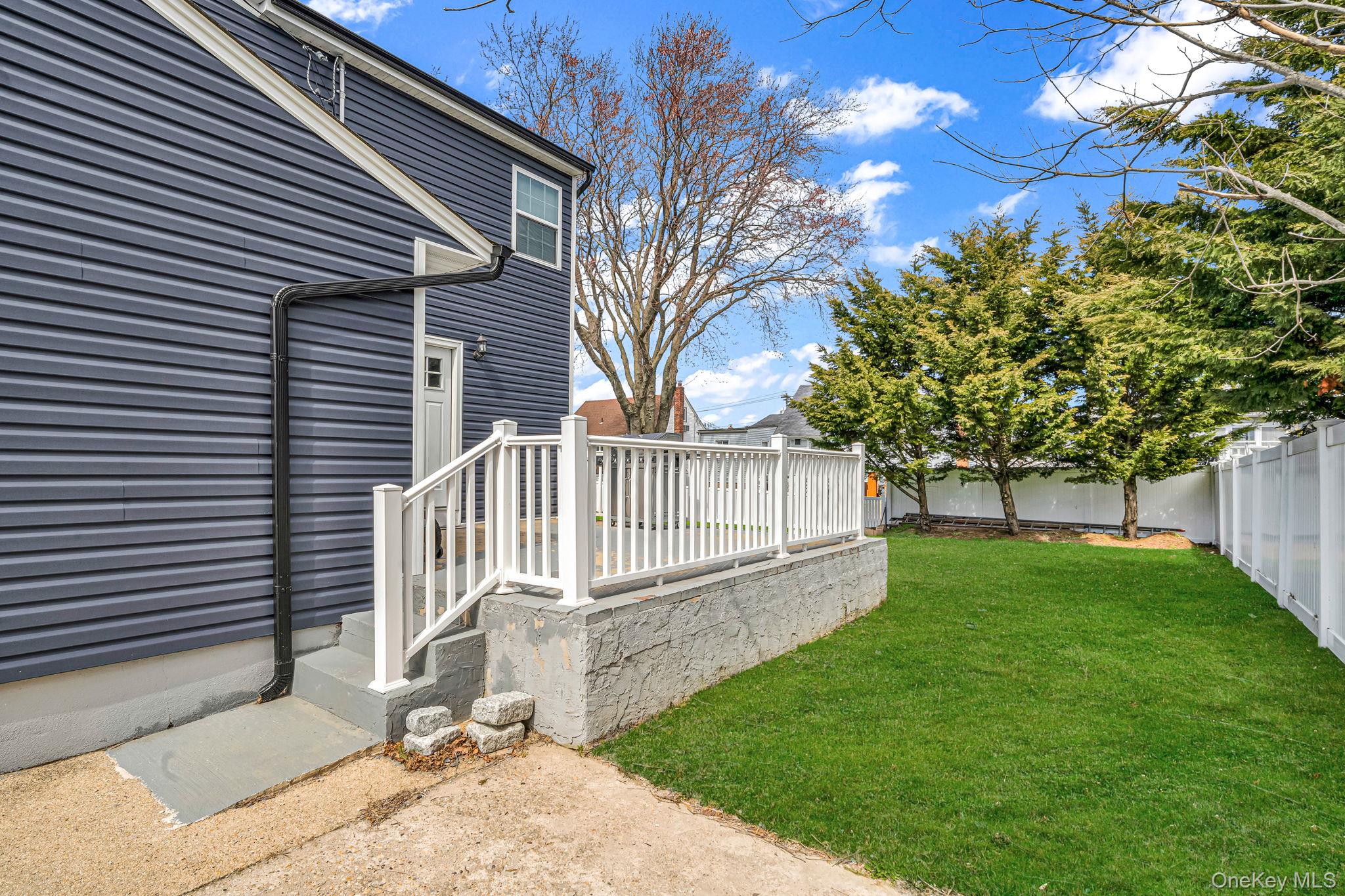 232 30th Street Lindenhurst, NY 11757 - Photo 40 of 46 a view of backyard with a small cabin